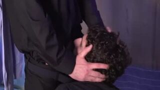 Poking firm accompanied by priest