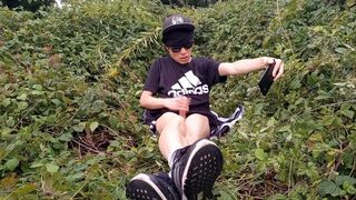 Lovely French-Chinese queer lad faps off his smoothly-shaven boner outside blows a load fat spunk catapulting to his frigs